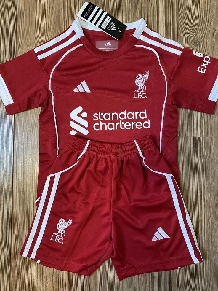 ❤️ Liverpool FC Kids' Home jersey set. This isn't just a shirt; it’s a matching jersey and shorts combo that provides a professional, unified look that kids absolutely love.