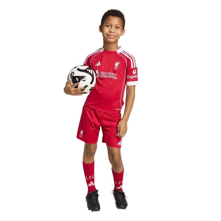 ❤️ Liverpool FC Kids' Home jersey set. This isn't just a shirt; it’s a matching jersey and shorts combo that provides a professional, unified look that kids absolutely love.