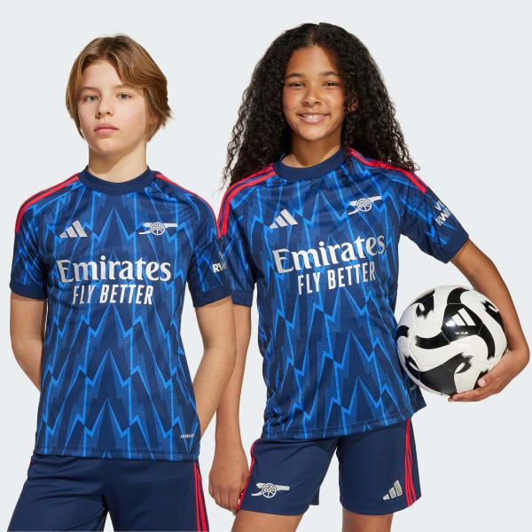 PRICE DROP! Arsenal FC Kids' Away Kit 25/26 – Full 2-Piece Jersey & Shorts Set. Tired of replacing worn-out play clothes? Our Arsenal Away Set is engineered for the high-impact energy of active kids.