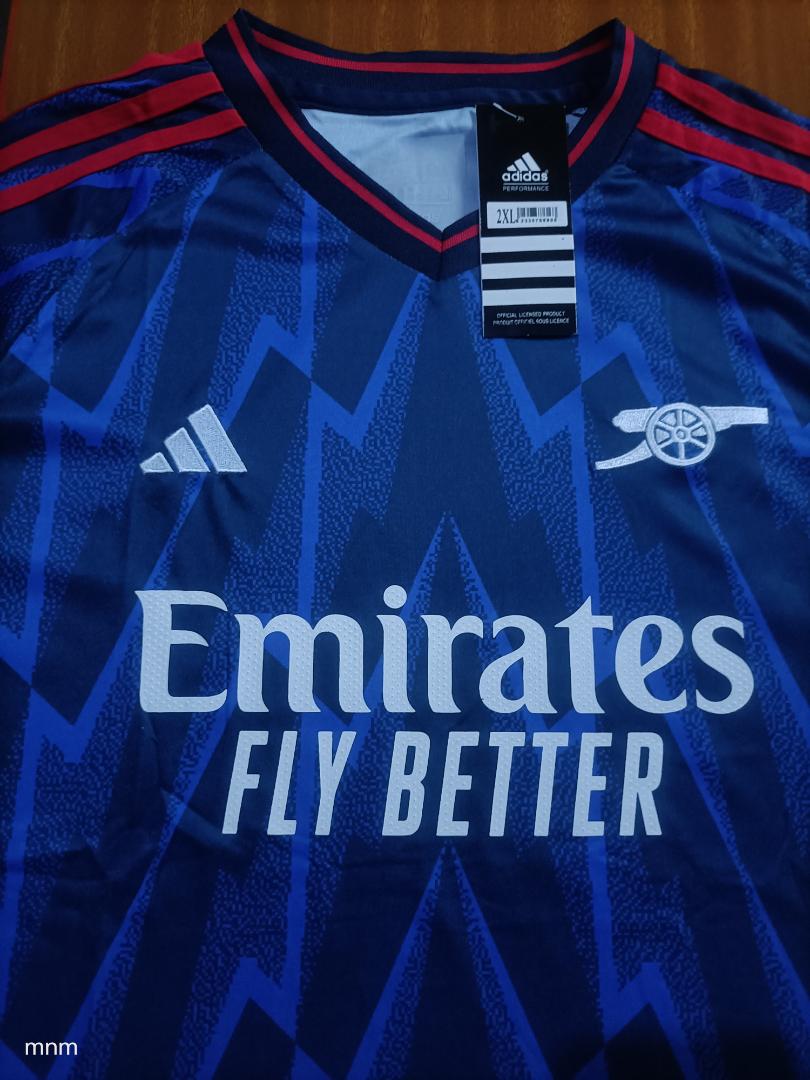 ARSENAL  (NIGHT BLUE) JERSEY. Whether you are playing a match on the pitch or cheering from the stands, this jersey is built for performance. Few units remaining, grab one before they run out.