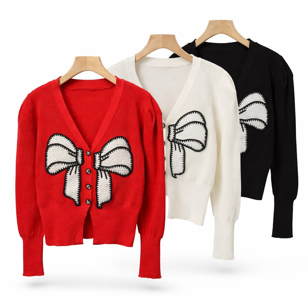 The Statement Bow Cardigan is a charming, feminine knit designed to stand out effortlessly.