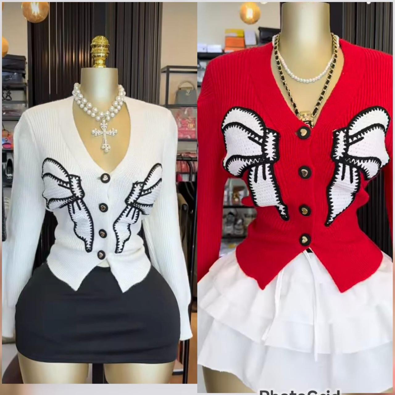 The Statement Bow Cardigan is a charming, feminine knit designed to stand out effortlessly.