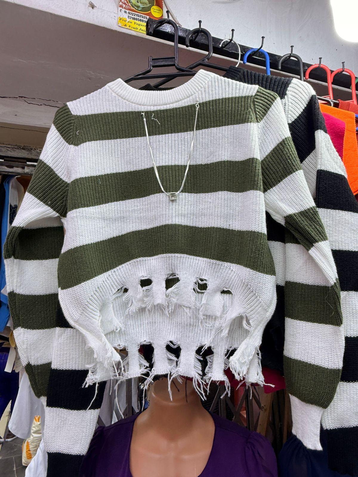 Women's Free Size Midnight Rebel Striped Cropped Sweater that has a silver chain.