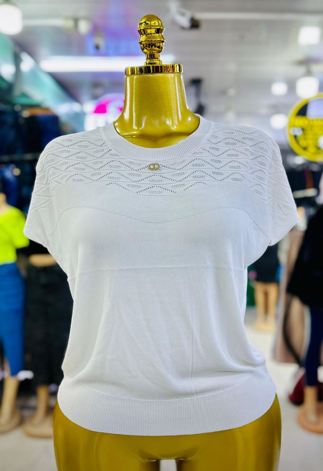 The Golden Aura Luxe Knit Top-One size fits ALL- designed to elevate everyday style with a touch of refined elegance. Its radiant one instantly captures attention, making it a standout piece.