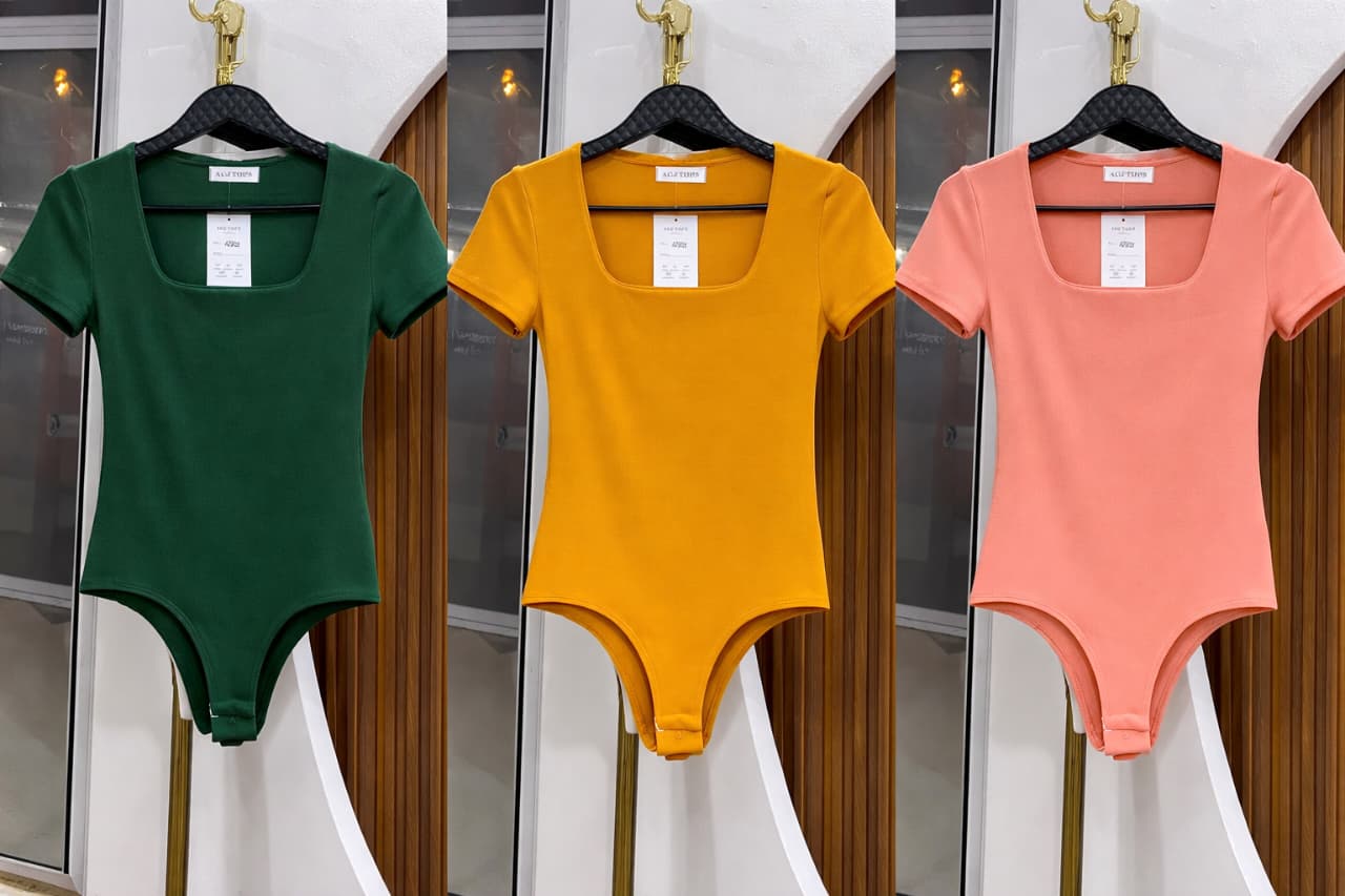 Ladies' Scarlet Sculpt Luxe Bodysuit Size M to XL the ultimate fusion of bold elegance and everyday comfort.Designed for the modern woman who loves to stand out, this striking red piece hugs your body