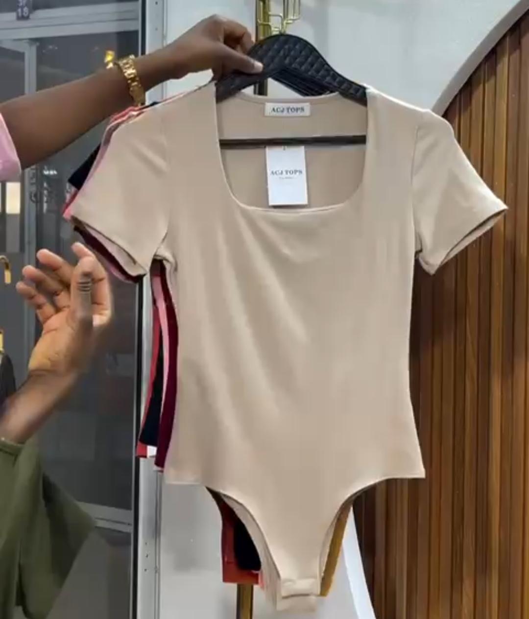 Ladies' Scarlet Sculpt Luxe Bodysuit Size M to XL the ultimate fusion of bold elegance and everyday comfort.Designed for the modern woman who loves to stand out, this striking red piece hugs your body