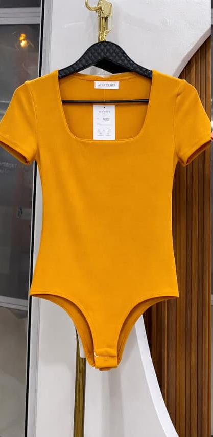 Ladies' Scarlet Sculpt Luxe Bodysuit Size M to XL the ultimate fusion of bold elegance and everyday comfort.Designed for the modern woman who loves to stand out, this striking red piece hugs your body