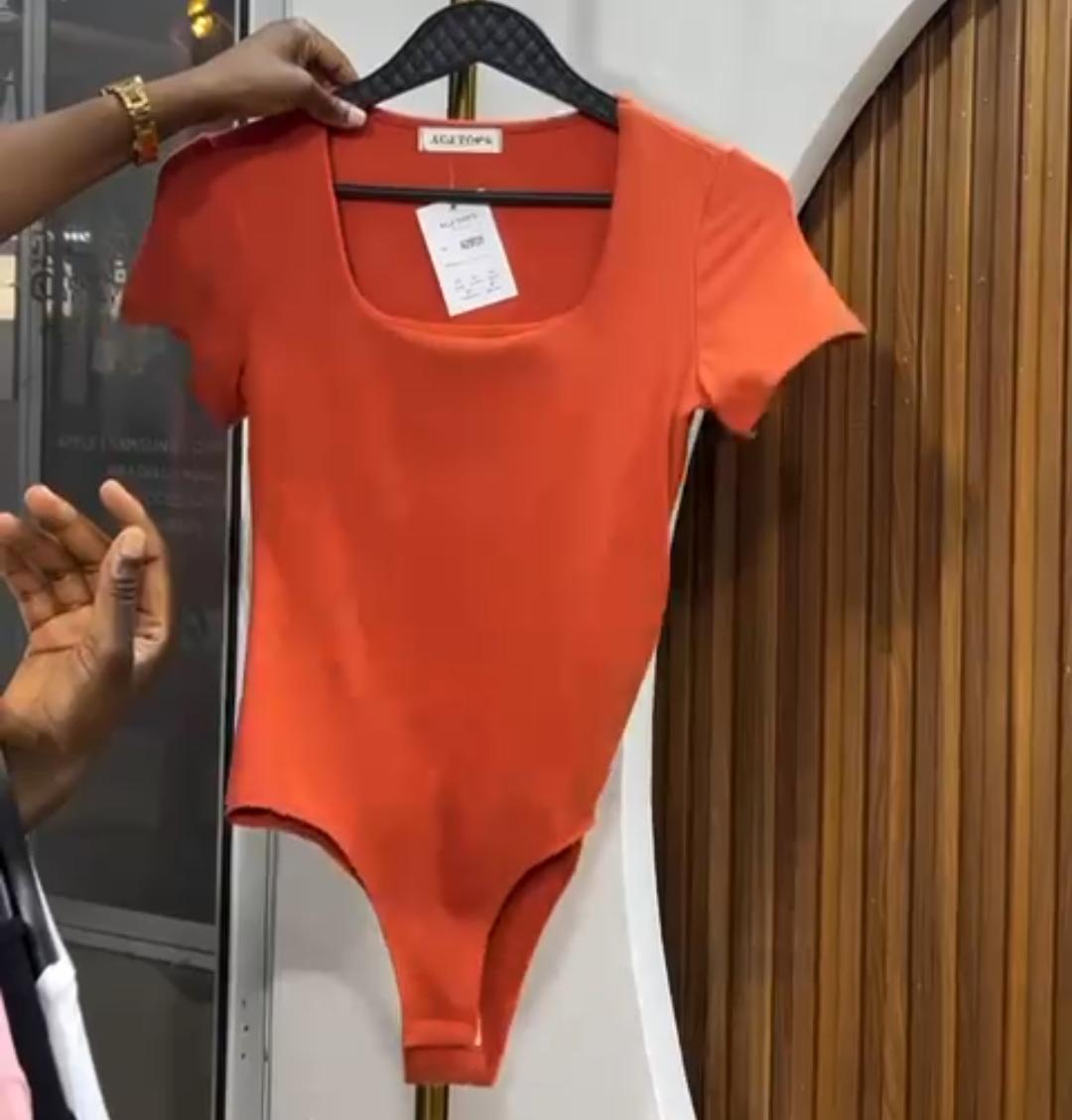 Ladies' Scarlet Sculpt Luxe Bodysuit Size M to XL the ultimate fusion of bold elegance and everyday comfort.Designed for the modern woman who loves to stand out, this striking red piece hugs your body