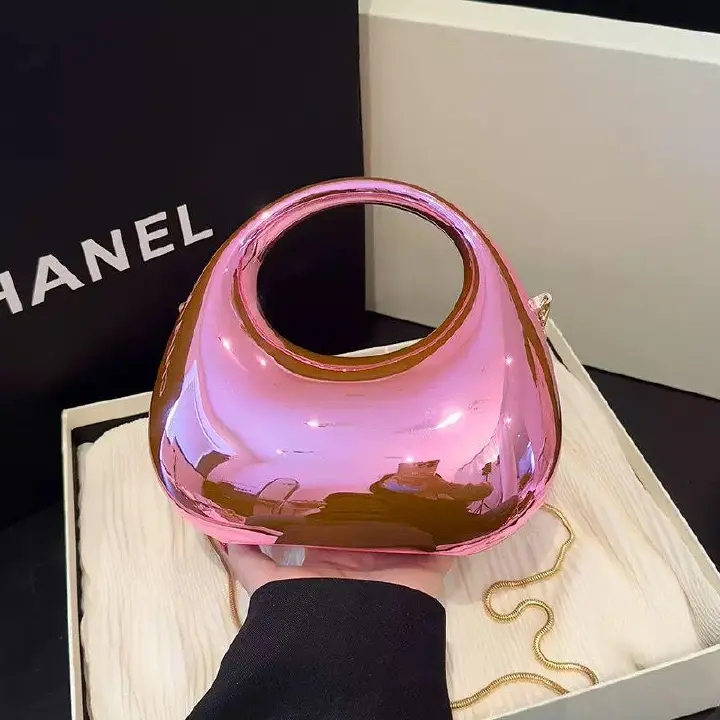 “Premium Rosé Chrome Designer-Style Purse – Futuristic Hard-Shell Handbag with Gold Chain, Statement Fashion Bag for Weddings, Dinner Dates & Special Occasions.”