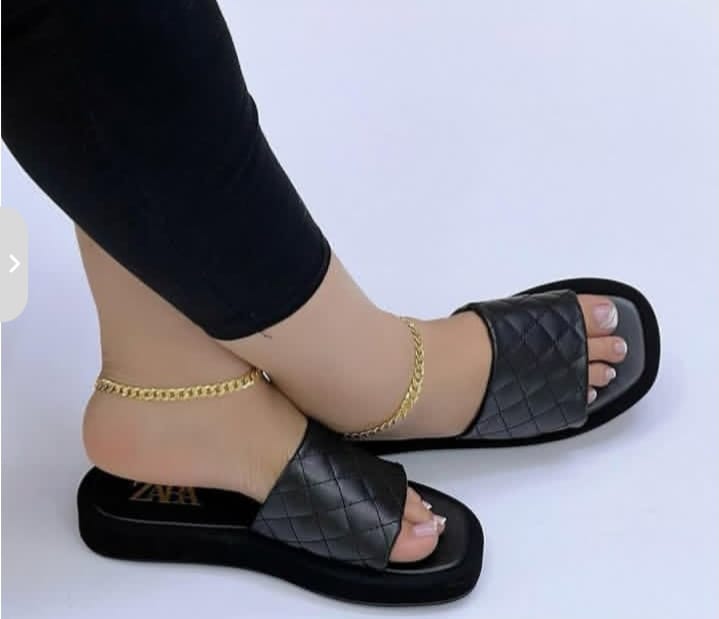 Quilted platform slide Zara wedge sandals featuring soft padded upper, elevated wedge sole, slip-on design, chic contemporary style, comfortable fit, and versatile fashion-forward look for casual or d