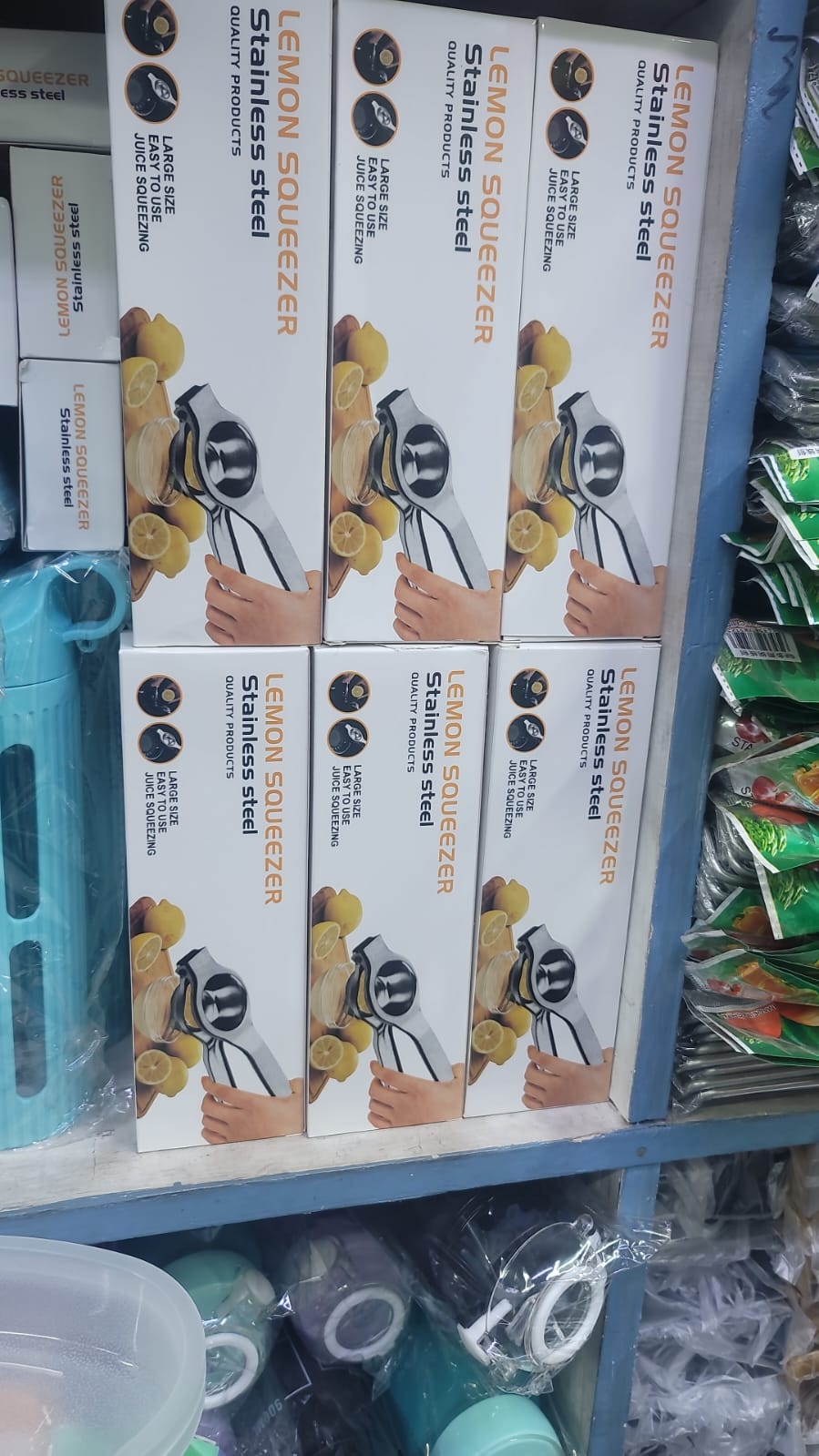 LEMON SQUEEZER. Stainless steel Lemon Squeezer, Durable and long lasting, designed to extract juice from lemons or other citrus fruits such as oranges, grapefruit, or lime