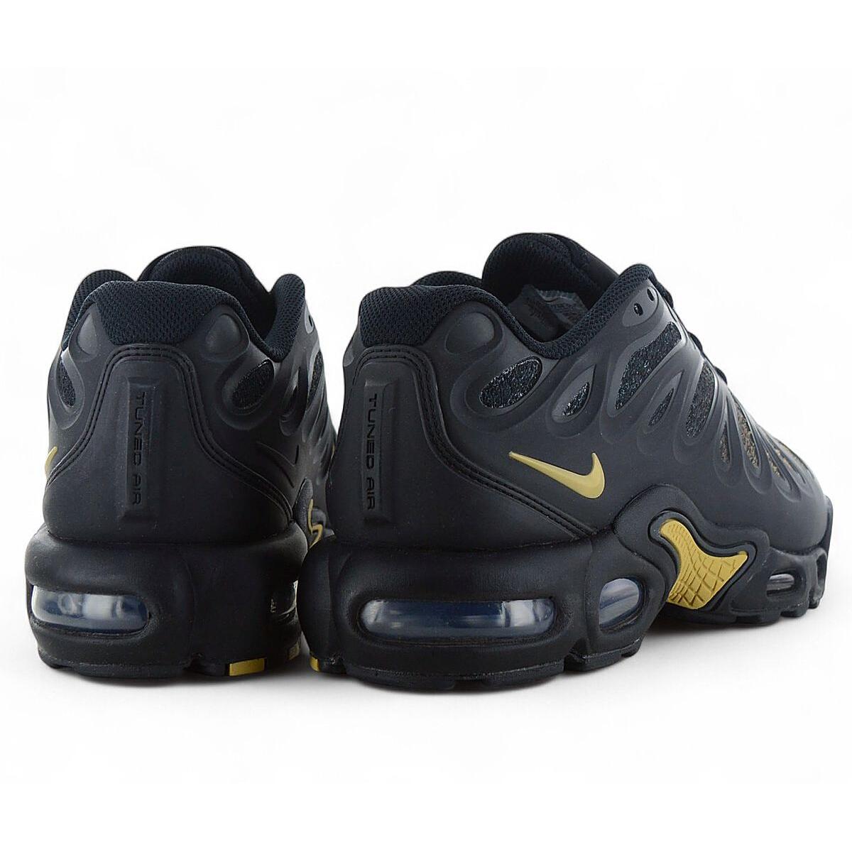 Nike Air Max Plus (TN) — specifically the Black/Gold colorway (often called “Black Metallic Gold TN”).