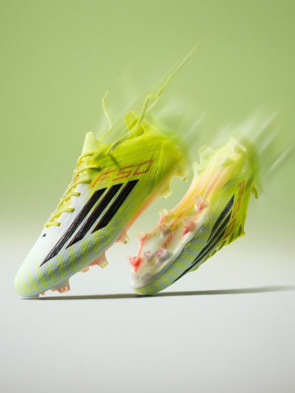 These are Adidas F50 Elite soccer cleats, specifically in the Team Solar Yellow / Core Black / Lucid Red colorway.