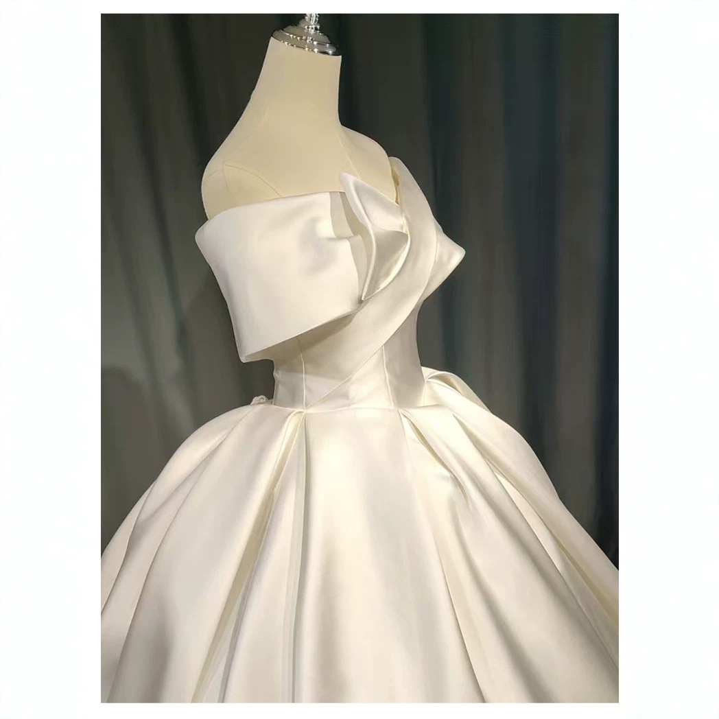 New one-shoulder satin main yarn with huge bow and large pleated skirt, elegant lady-like main wedding dress