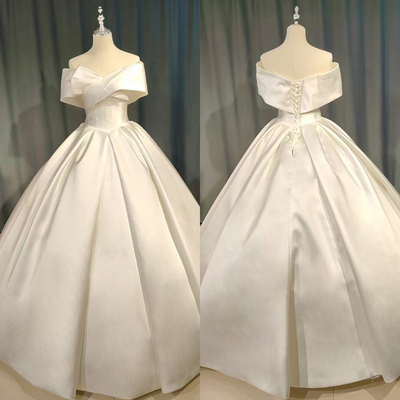 New one-shoulder satin main yarn with huge bow and large pleated skirt, elegant lady-like main wedding dress
