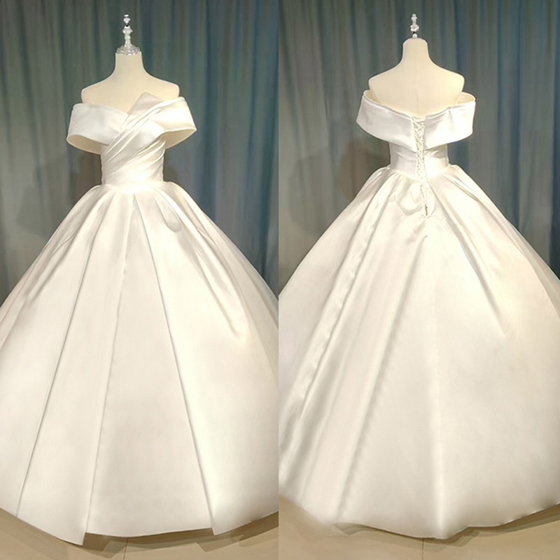 French wedding dress bride's new main yarn high-quality champagne color main yarn satin one-shoulder tail dress