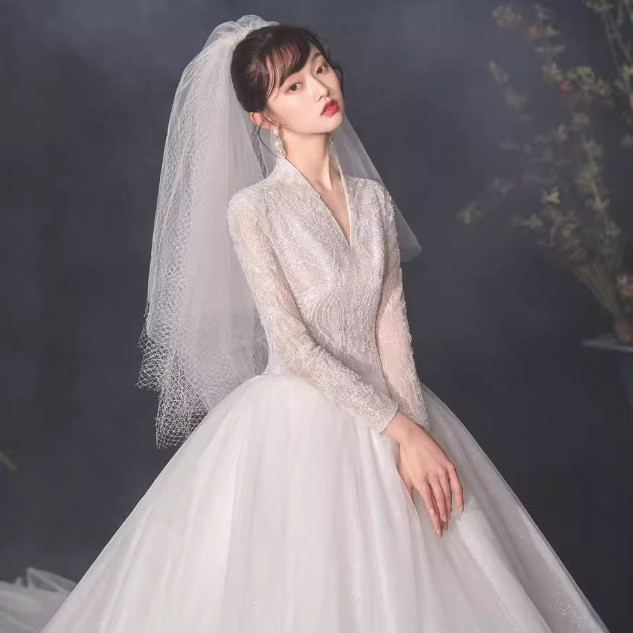 Starry sky light main wedding dress new bride V-neck long-sleeved French big tail slimming temperament retro princess style