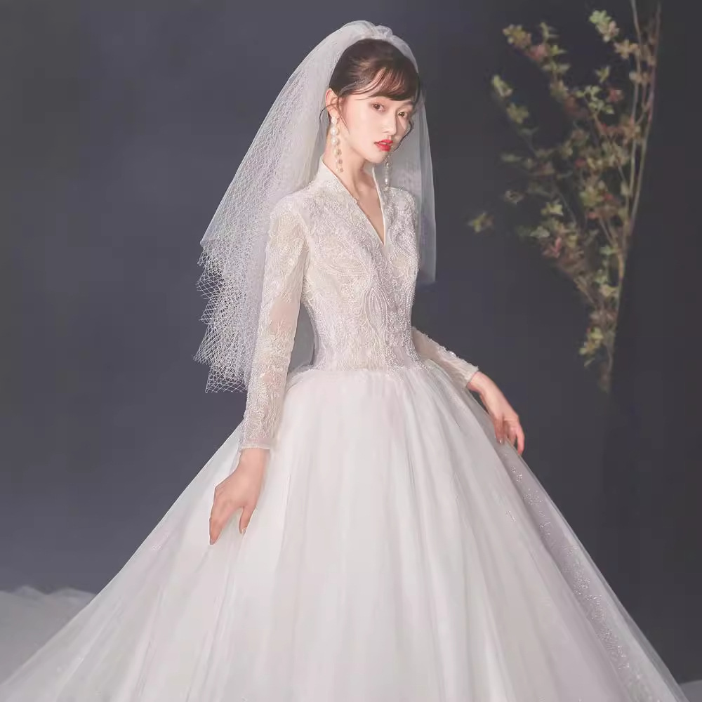 Starry sky light main wedding dress new bride V-neck long-sleeved French big tail slimming temperament retro princess style