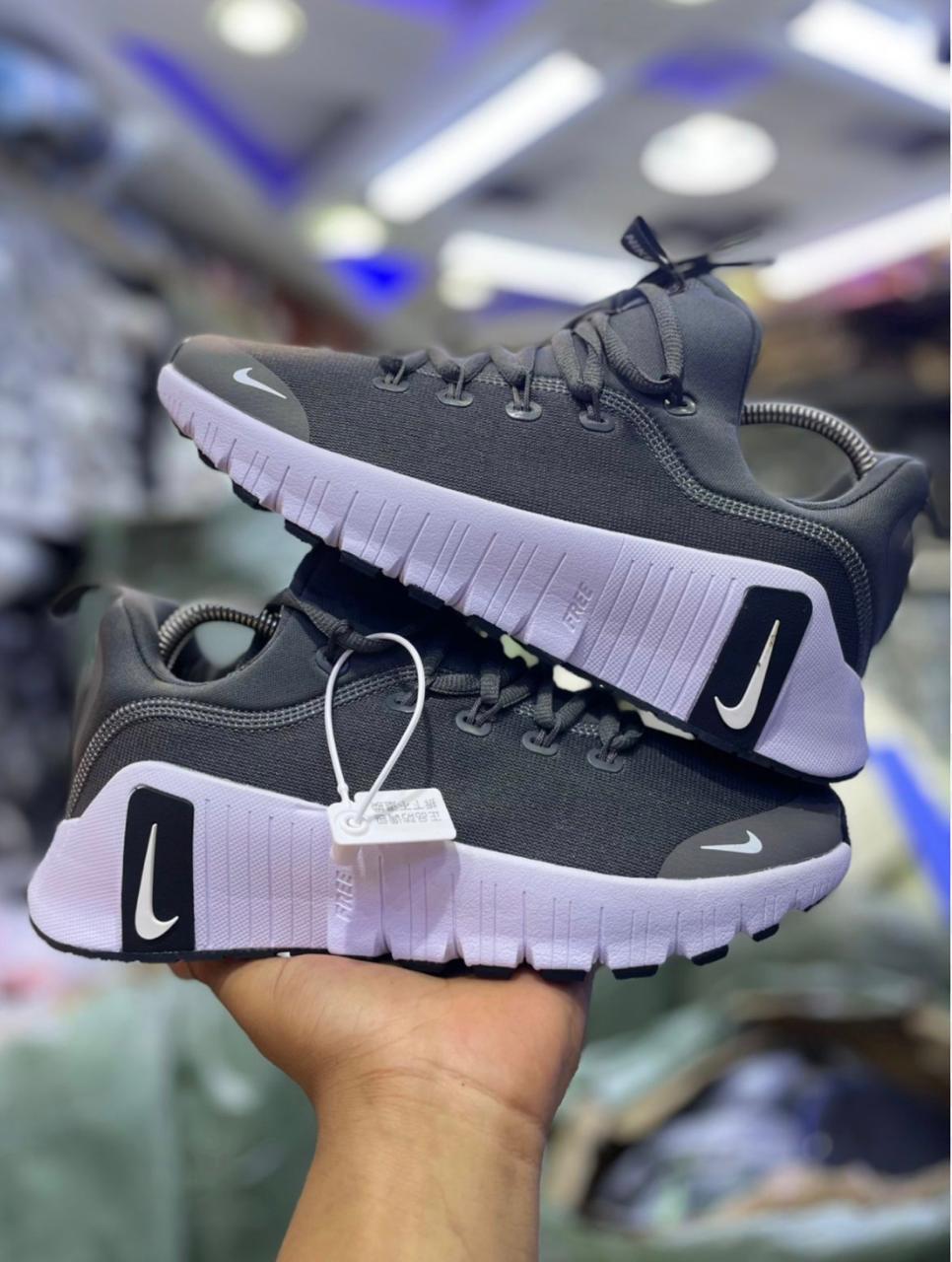 Free Metcon: Versatile training shoe that blends Nike Free flexibility in the forefoot with Metcon stability in the heel for dynamic workouts, breathable mesh upper, secure fit, and reliable traction