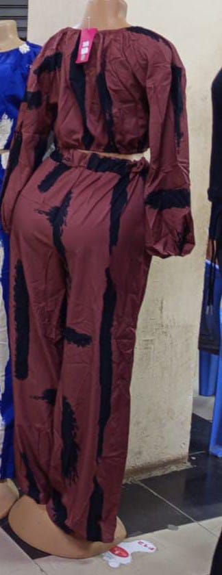 Trendy two piece outfits for ladies
off-shoulder crop top and wide-leg pants with an abstract print