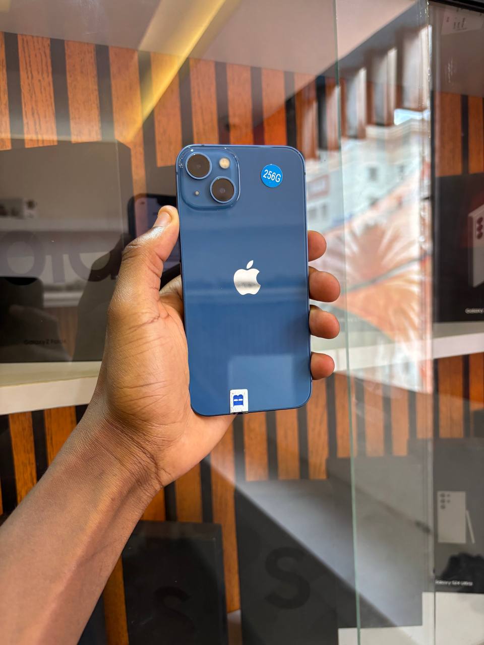 THE IPHONE 13 256GB OF STORAGE WITH A BATTERY PERCENT OF 94% NOTHING CHANGED HAS A 6.1 IN OLED DISPLAY, A15 BIONIC CHIP, DUAL 12 MP CAMERAS, 5G SUPPORT, AND IMPROVED BATTERY LIFE.