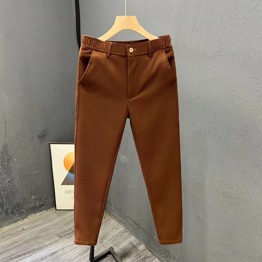 Spring and summer new men's trousers fashion solid color slim straight trousers men's cropped trousers are suitable for daily leisure and commuting.