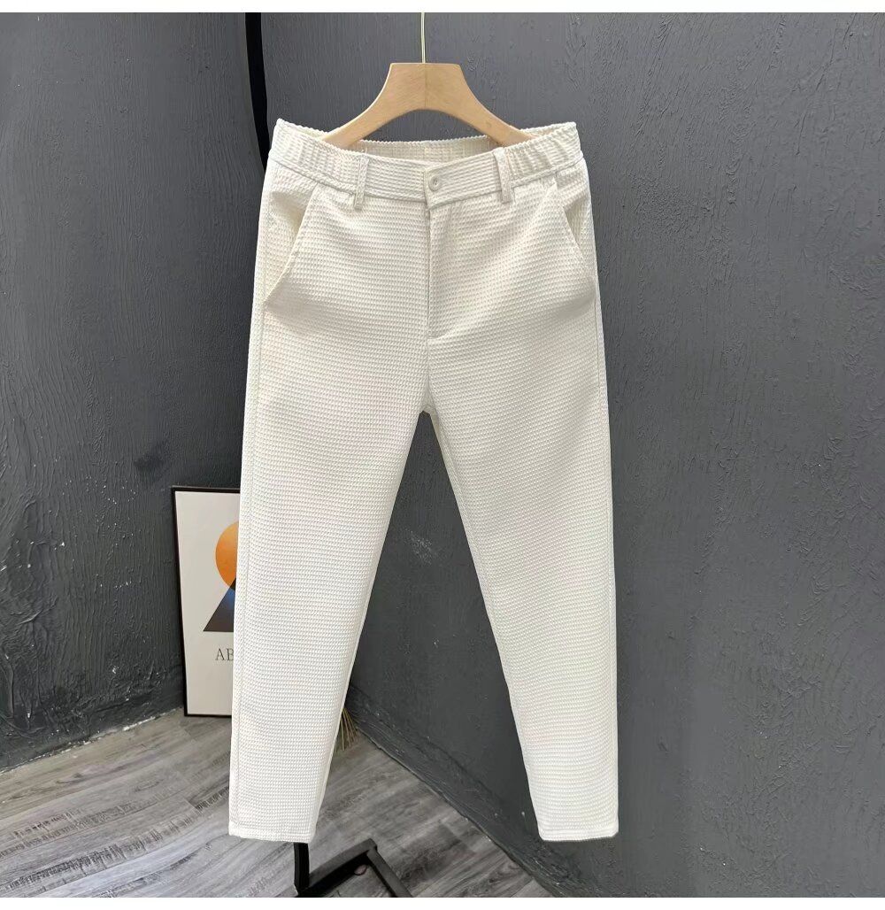 Spring and summer new men's trousers fashion solid color slim straight trousers men's cropped trousers are suitable for daily leisure and commuting.