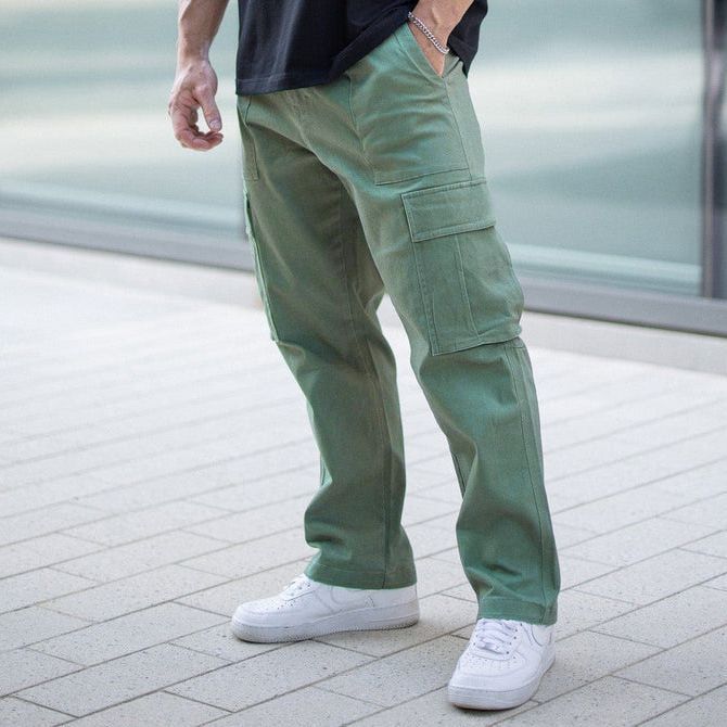 New men's trousers stitching solid color big pocket tooling trousers men's autumn leisure sports loose feet pants suitable for daily leisure commuting outdoor sports wear.