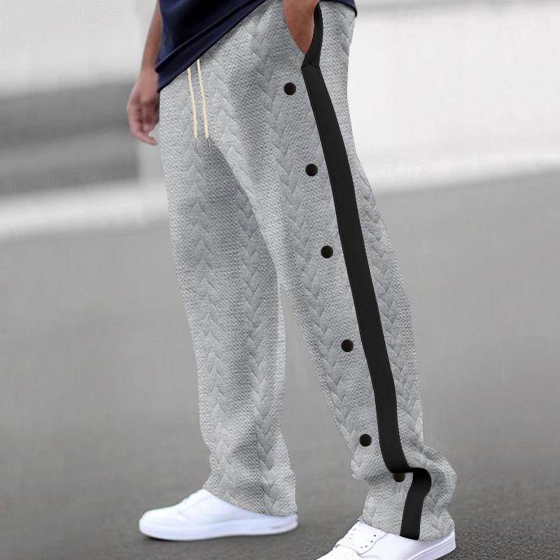 New men's trousers color matching jacquard buttons Four seasons leisure sports trousers are suitable for daily leisure commuting outdoor sports wear.