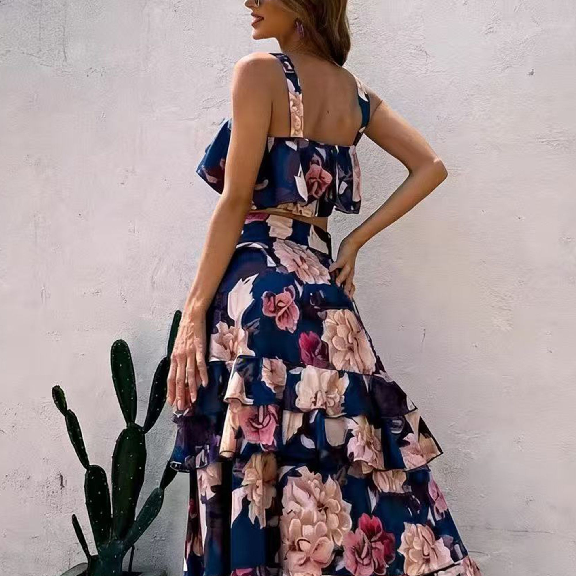 Elegant printed layered ruffle dress – a halter-neck, midi dress perfect for parties and vacations. Two-piece set.