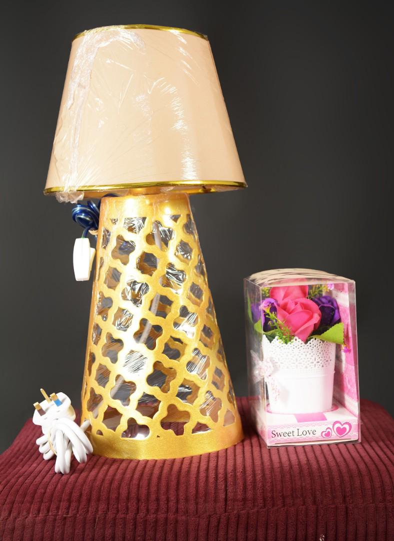 Luxury practical artistic Lamp. great for couples and Gift for loved ones.50cm height 20 cm width. comes with a two colour bulb and a traditional cable switch.