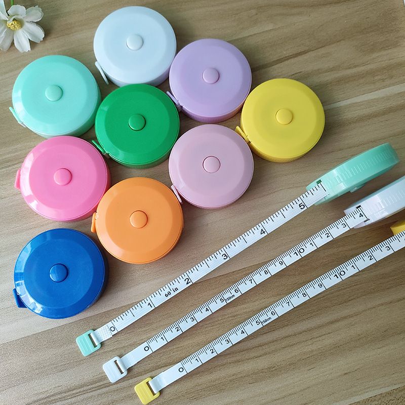Flexible tape measure in stock, telescopic mini clothing measuring tape, 1.5-meter round clothing color plastic tape measure, measuring leather tape measure wholesale
