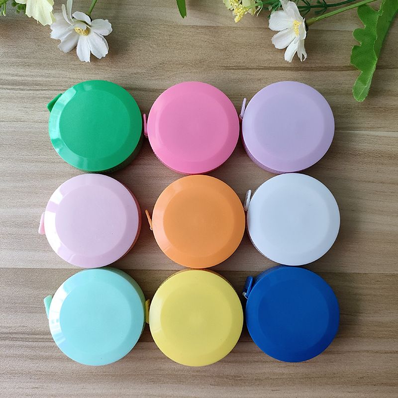 Flexible tape measure in stock, telescopic mini clothing measuring tape, 1.5-meter round clothing color plastic tape measure, measuring leather tape measure wholesale