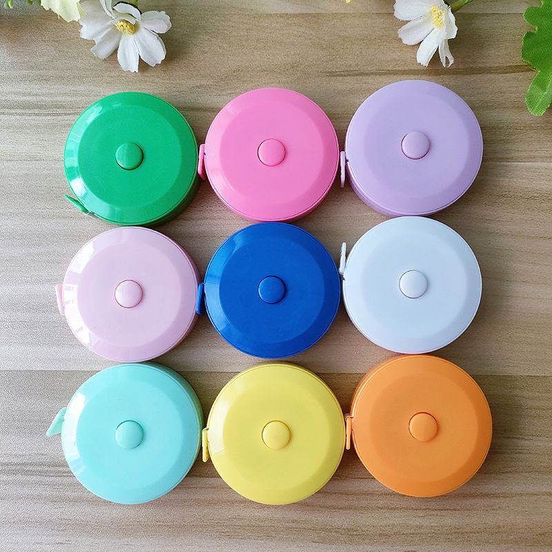 Flexible tape measure in stock, telescopic mini clothing measuring tape, 1.5-meter round clothing color plastic tape measure, measuring leather tape measure wholesale