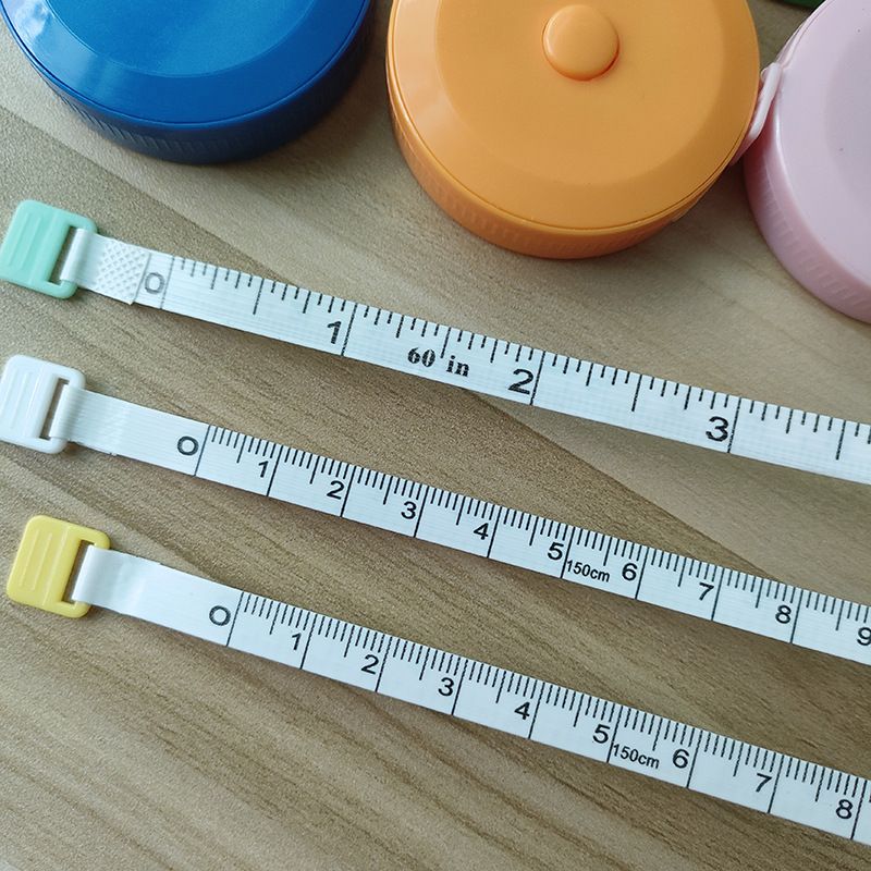 Flexible tape measure in stock, telescopic mini clothing measuring tape, 1.5-meter round clothing color plastic tape measure, measuring leather tape measure wholesale