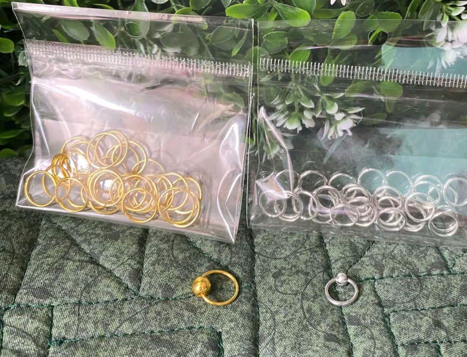 Gold and Silver Rings hair charms /braid charms or hair hoops, which are used as decorative accessories for various hairstyles like braids, dreadlocks, and locs.