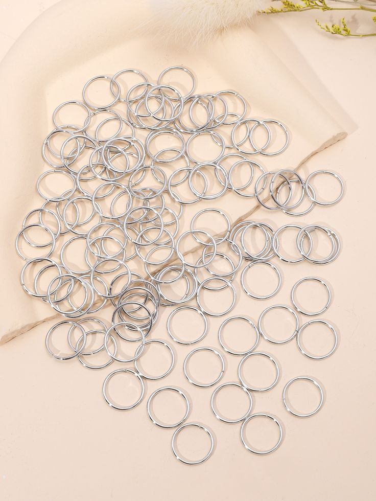 Gold and Silver Rings hair charms /braid charms or hair hoops, which are used as decorative accessories for various hairstyles like braids, dreadlocks, and locs.