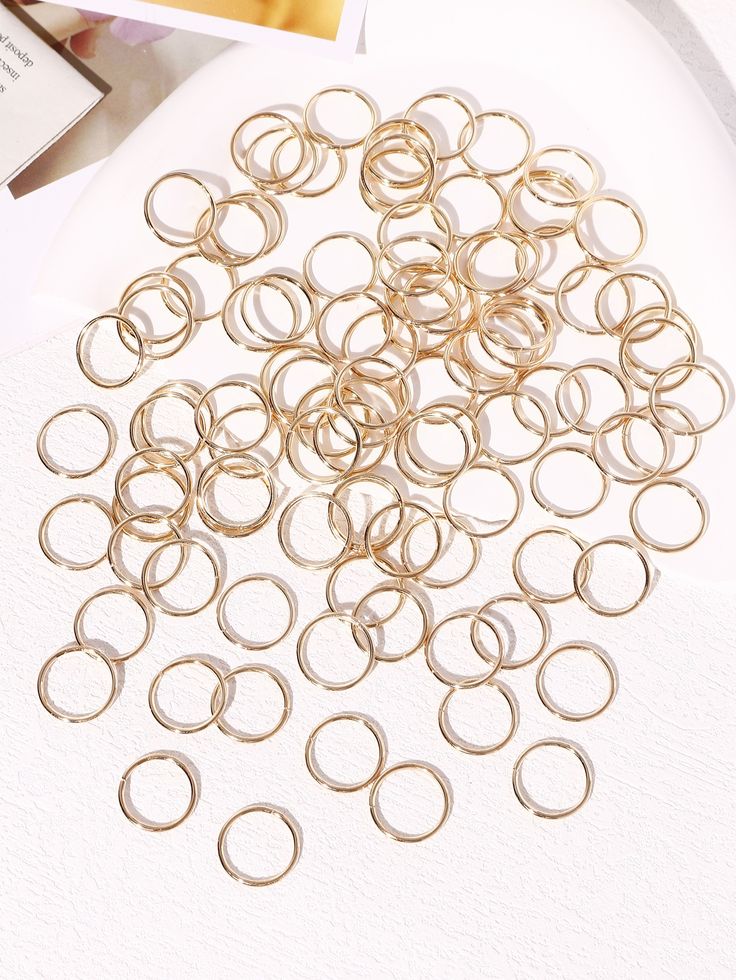 Gold and Silver Rings hair charms /braid charms or hair hoops, which are used as decorative accessories for various hairstyles like braids, dreadlocks, and locs.