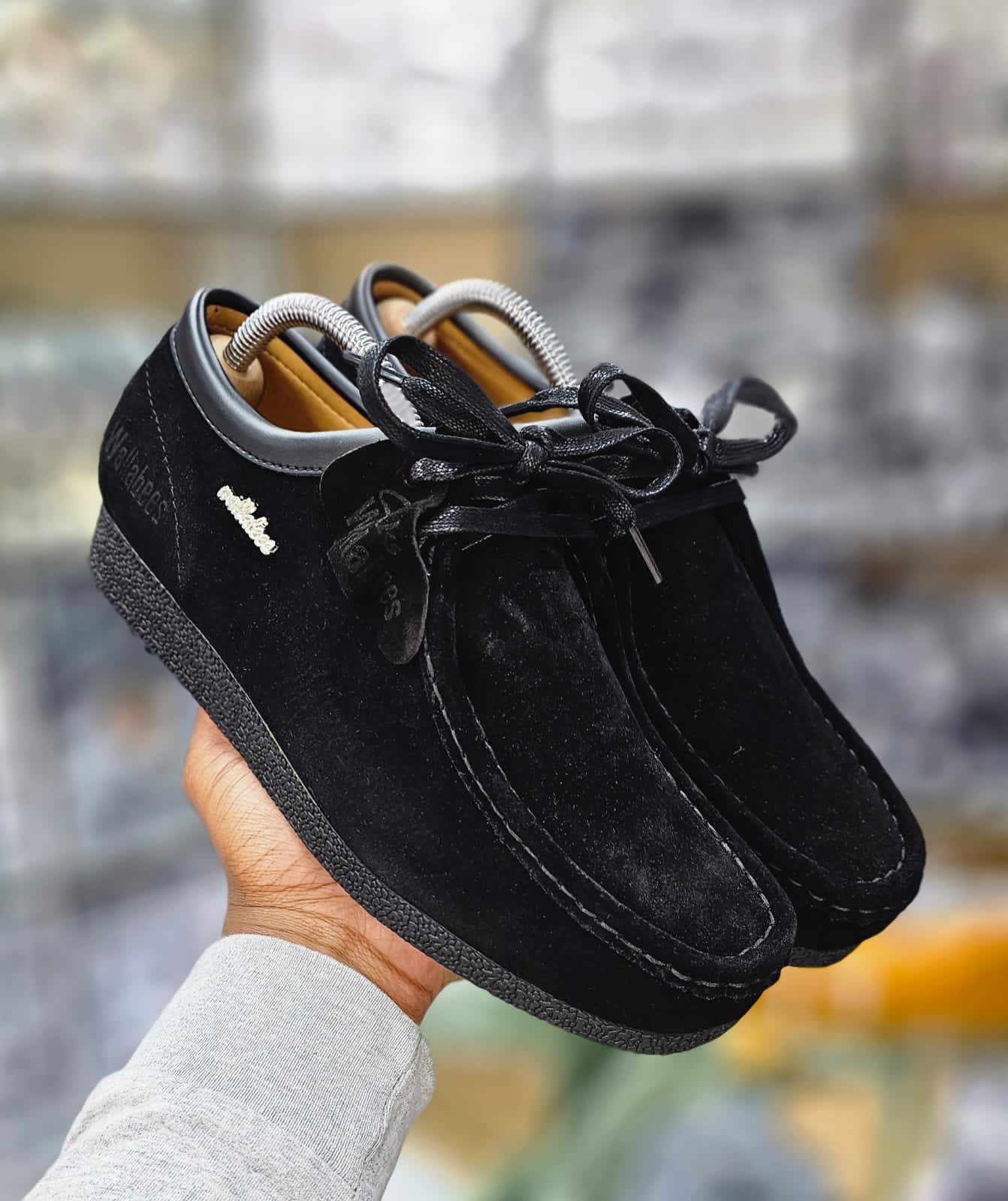 Clarks Wallabee Shoes – Timeless Comfort and Style Features a classic moccasin-inspired silhouette for a unique, timeless look. Premium Material: Made from high-quality suede