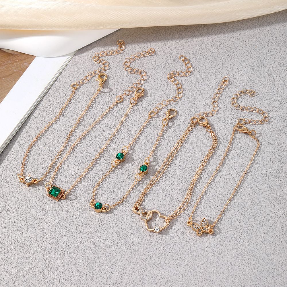 Cross border new European and American bracelet ins retro inlaid green diamond square bracelet inlaid diamond butterfly heart bracelet 4-piece set