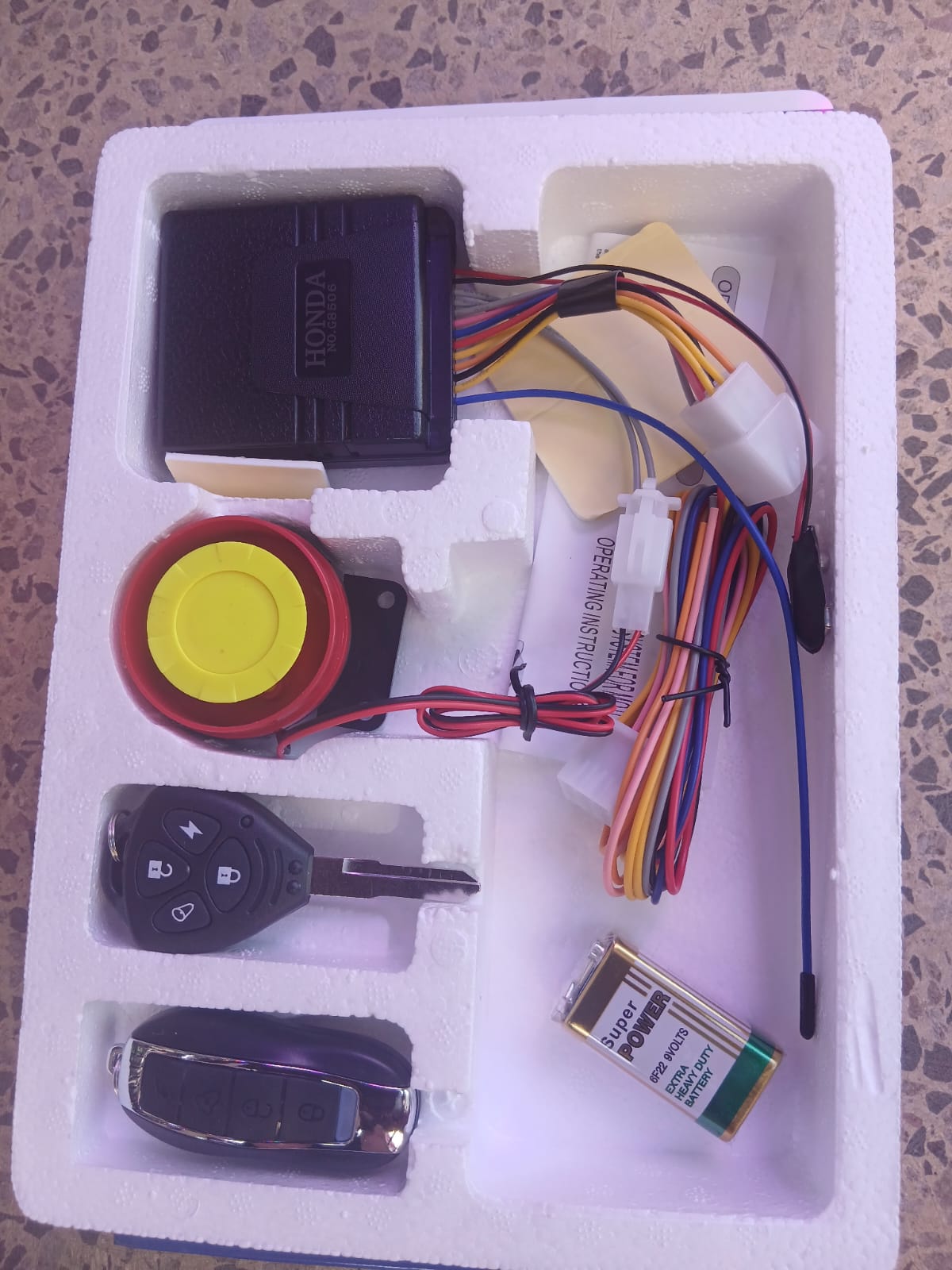 Honda Motorcycle Security Alarm System – Advanced Smart Anti-Theft Protection for Maximum Bike Safety, Smart Sensors, Remote Control & Real-Time Anti-Theft Protection. It also come with 1 KEY.