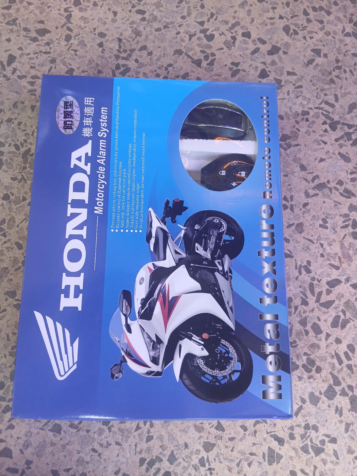 Honda Motorcycle Security Alarm System – Advanced Smart Anti-Theft Protection for Maximum Bike Safety, Smart Sensors, Remote Control & Real-Time Anti-Theft Protection. It also come with 1 KEY.
