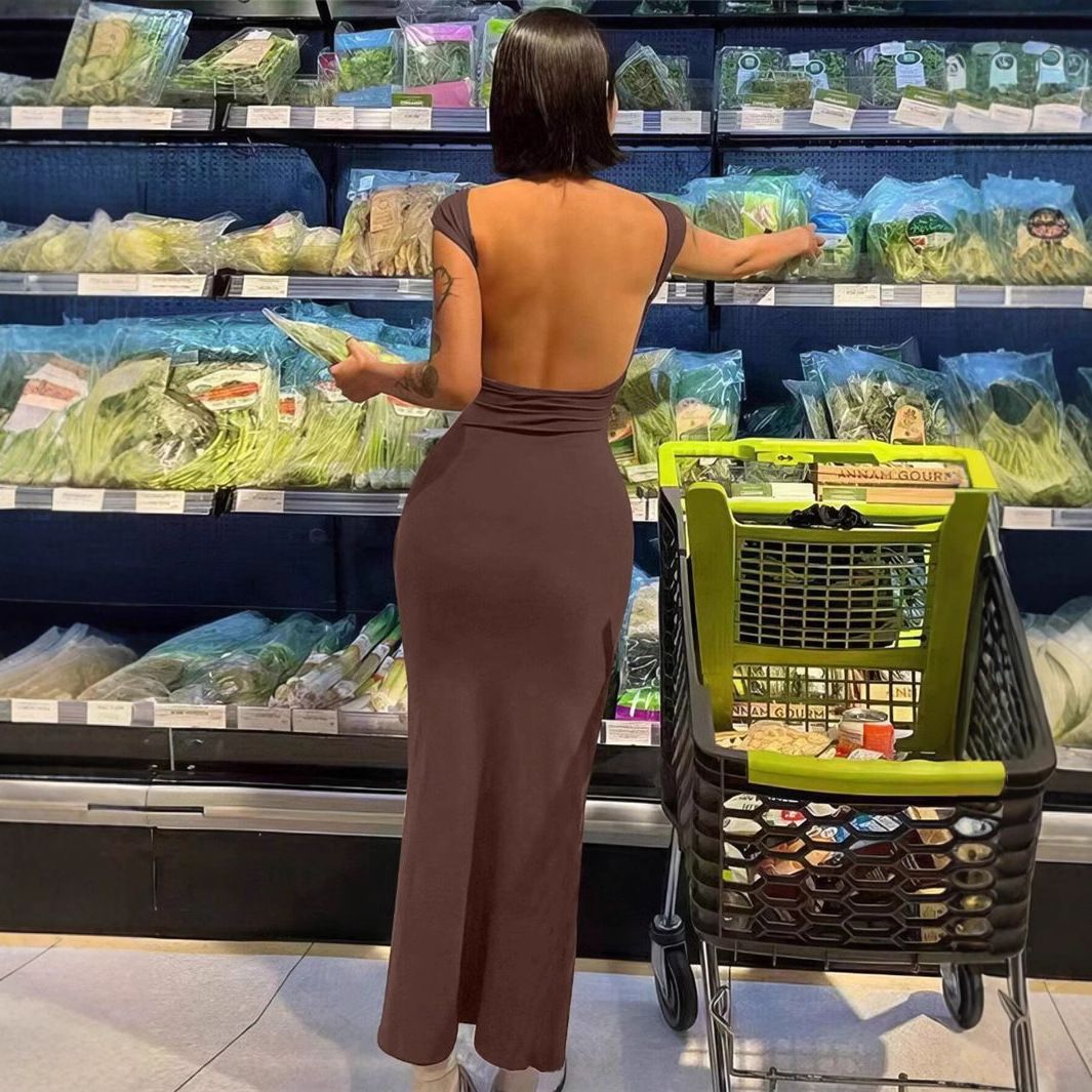 Summer new women's dress solid color short-sleeved round neck backless slim bag hip long dress is suitable for daily leisure commuting parties.