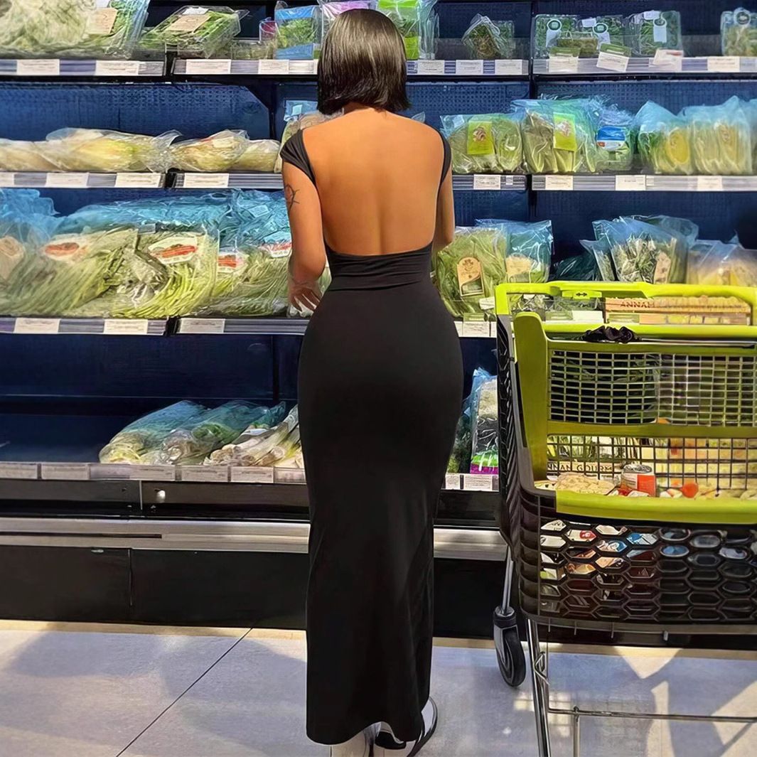 Summer new women's dress solid color short-sleeved round neck backless slim bag hip long dress is suitable for daily leisure commuting parties.