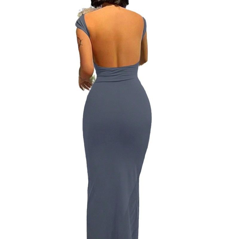 Summer new women's dress solid color short-sleeved round neck backless slim bag hip long dress is suitable for daily leisure commuting parties.
