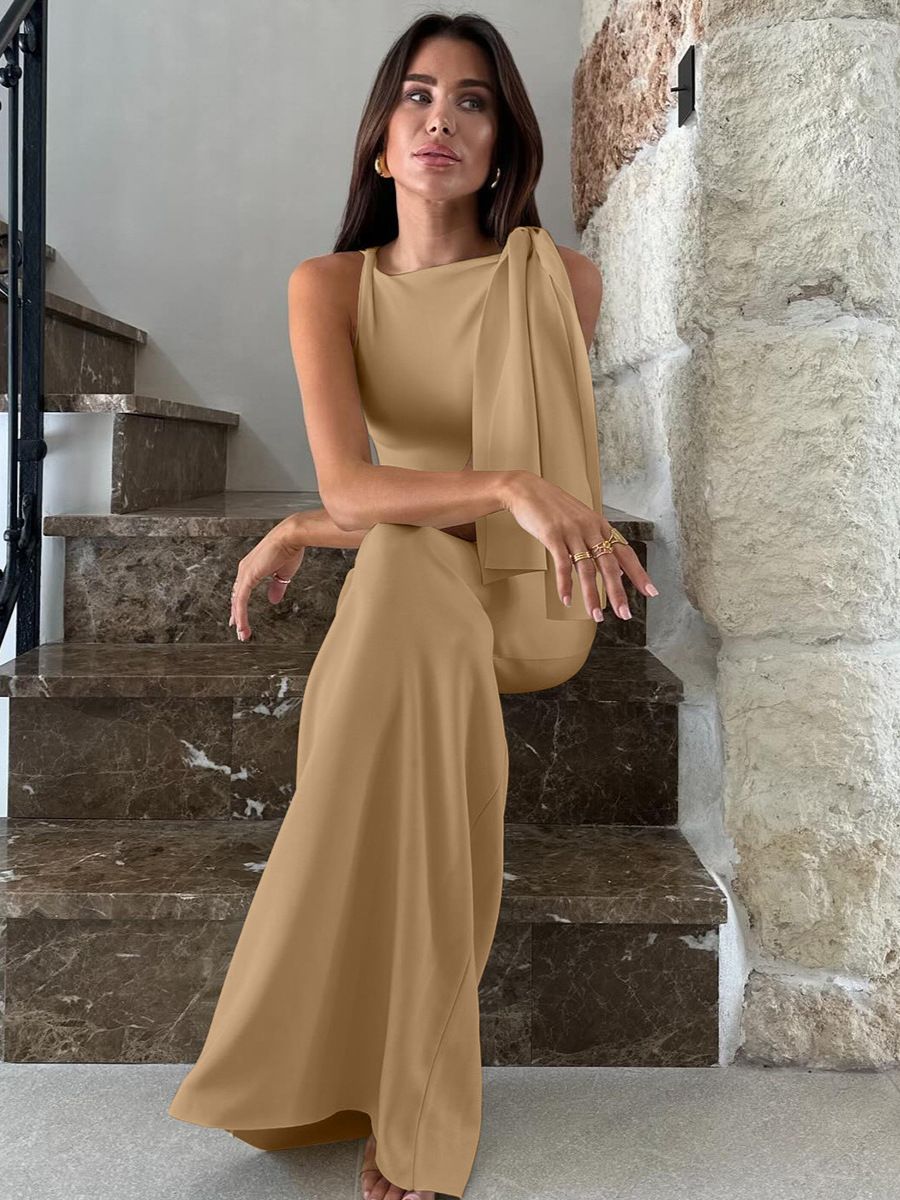 The new women's dress in summer is a solid color sleeveless one-shoulder ribbon slim long dress suitable for daily leisure commuting party dinner dress.