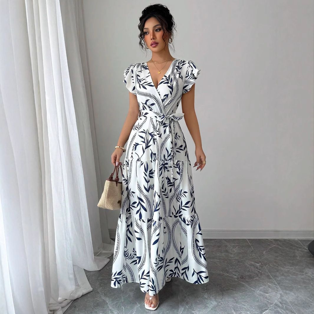 New women's dresses in summer are fashionable and elegant, printed with short sleeves, V-neck and big skirts. Long dresses are suitable for daily leisure commuting party dinner dresses.