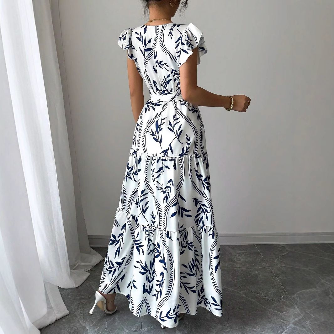 New women's dresses in summer are fashionable and elegant, printed with short sleeves, V-neck and big skirts. Long dresses are suitable for daily leisure commuting party dinner dresses.