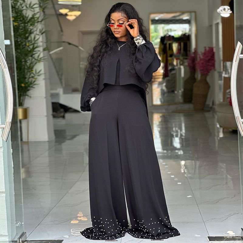 Summer new women's two-piece suit solid color long-sleeved round neck lantern sleeve short coat beaded wide-leg trousers suit is suitable for daily leisure commuting parties.