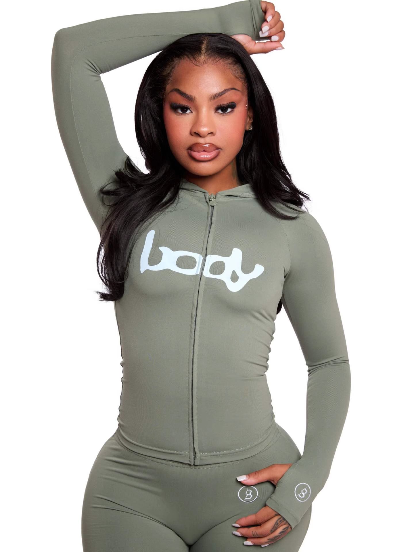 The new women's two-piece solid color printed long sleeve hooded zipper short coat tight trousers suit is suitable for daily leisure commuting outdoor sports wear.